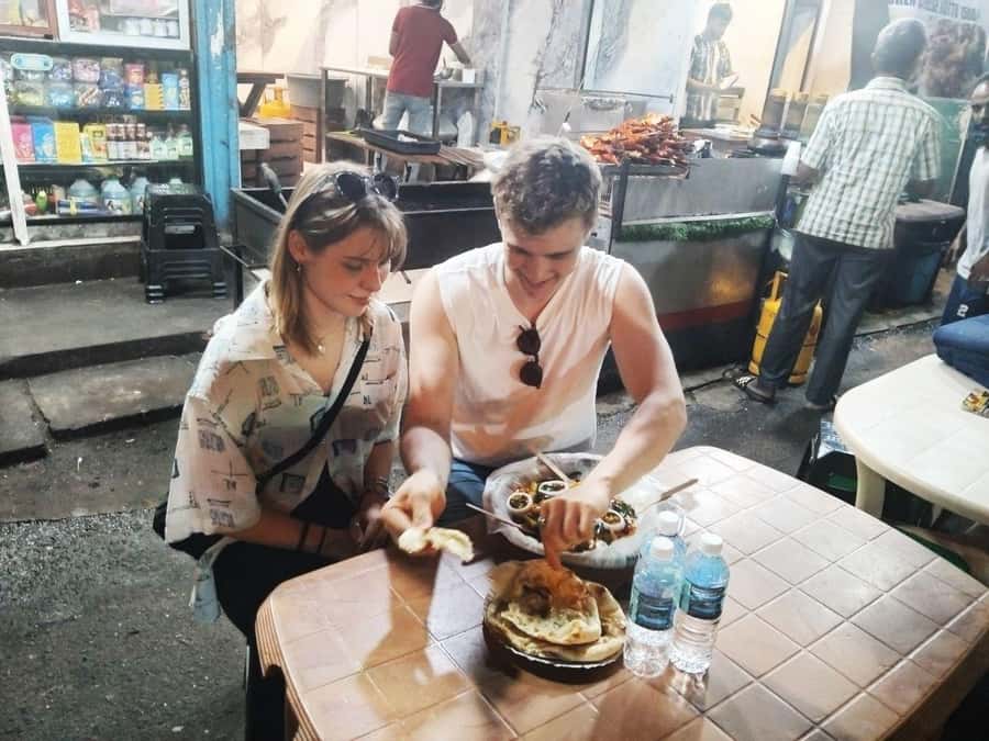 Colombo Foods Tour by Tuk Tuk ( Food chargers included ) - Pettah quick bites: samosa and cheese ball on the move