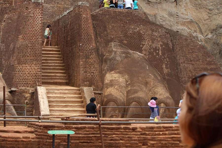 Colombo: Sigiriya Rock Fortress & Dambulla Cave Temple Tour - Sigiriya Rock Fortress: lion paws, frescoes, and the stair-burn reality