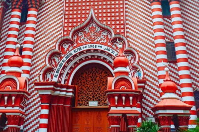 Explore Colombo City Highlights in a Private Tuk Tuk - Colombo Fort highlights: clock tower, prison cell, and a big stupa