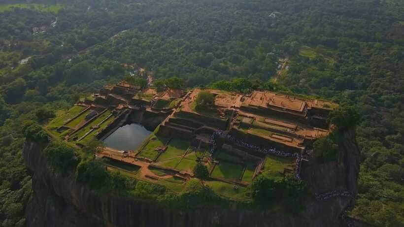 From Colombo: All Inclusive Sigiriya, Dambulla &Village Tour - Dambulla Cave Temple and the Golden Temple: Art, statues, and a long historical arc