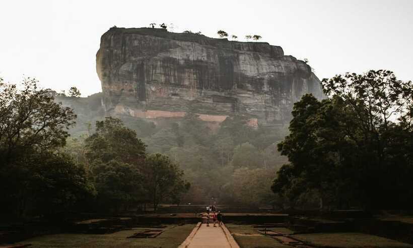 From Colombo: Sigiriya Rock Sunrise Climb with Dambulla … - Dambulla Cave Temple and Golden Temple: art, statues, and stairs