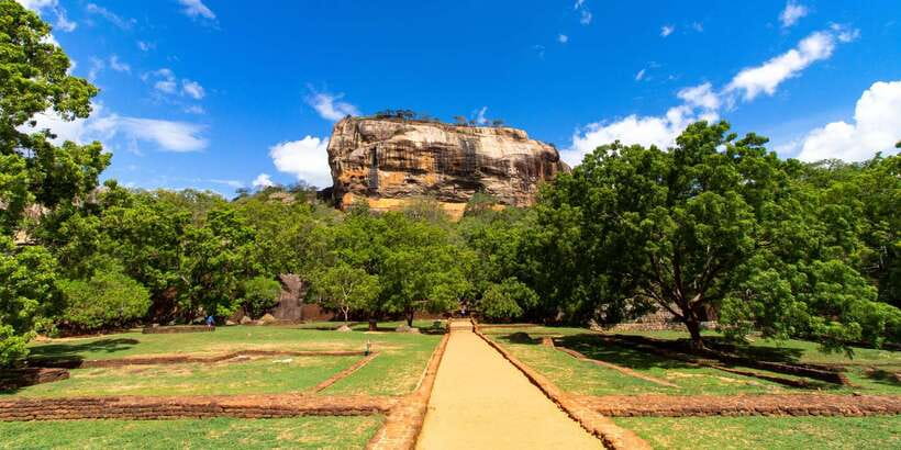 From Kandy: Sigiriya Rock & Dambulla Cave Temple Adventure - Sigiriya Lion Rock vs Pidurangala Rock: choose your climb and your payoff