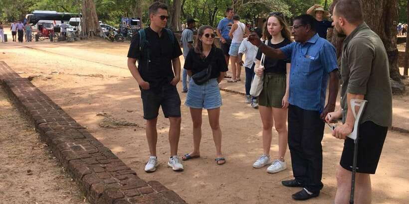 From Sigiriya: Polonnaruwa Ancient City & Minneriya Safari - Polonnaruwa guided ruins and the Gal Viharaya blessing moment