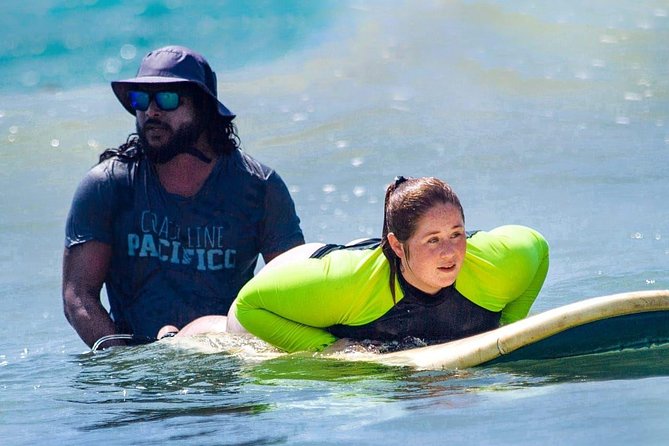 PRIVATE Surf Lesson for Beginners - Gear included: board and a long-sleeved top